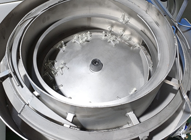 Máquina rotativa de cuatro estaciones para la vejiga interna del esfigmomanómetro.  